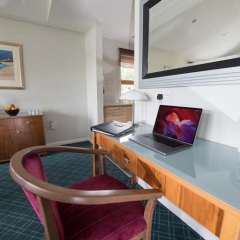 A desk area  in a chalet at Loch Lomond Waterfront