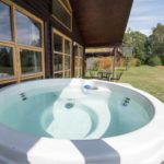 A hot tub outside a Chalet at Loch Lomond Waterfront