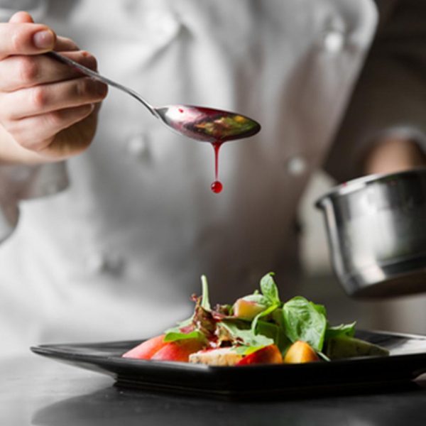A chef cooking a dish