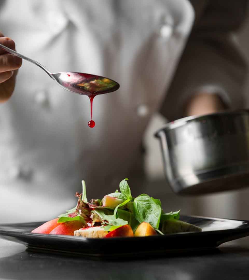 A chef preparing a dish