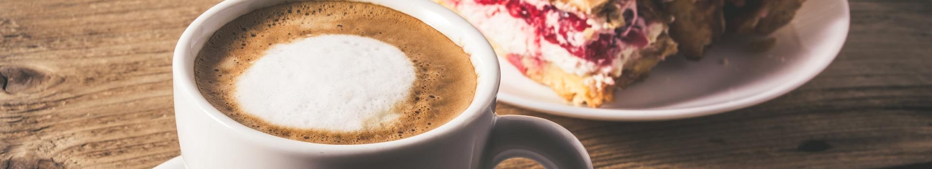 Coffee and cake on a wooden table