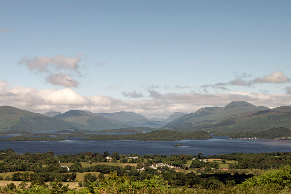 View from the top of Duncryne Hill, looking over Gartocharn village to Loch Lomond, Ben Lomond, and the hills above Arrochar and Luss