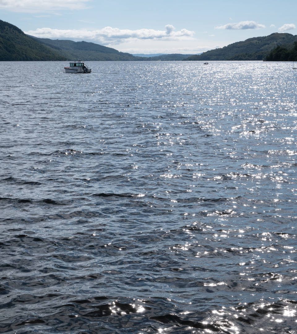 Looking south across Loch Lomond from Tarbet Pier on a sunny morning.