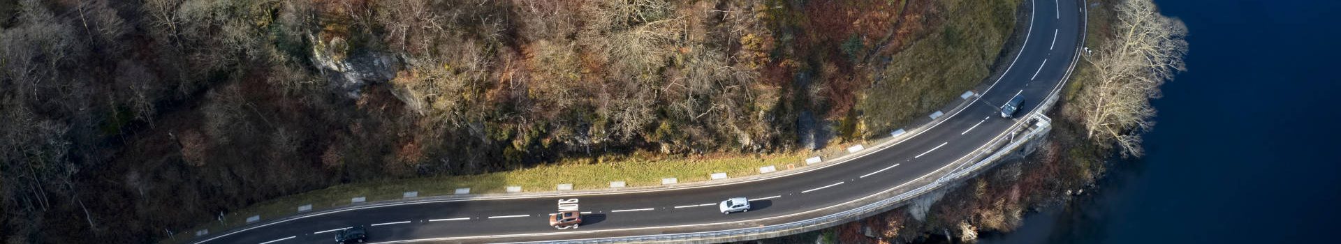 Loch Lomond aerial view showing the A82 road during autumn