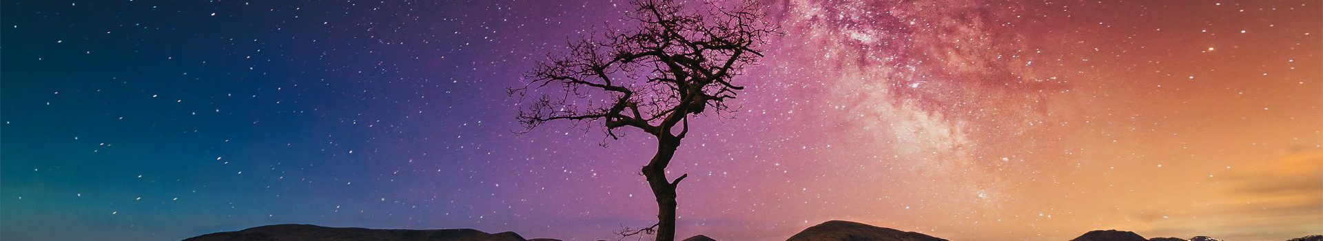 Starry sky over Loch Lomond in Scotland