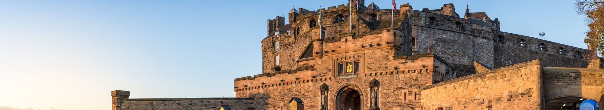 The Edinburgh Castle on a cold autumn morning at sunrise.