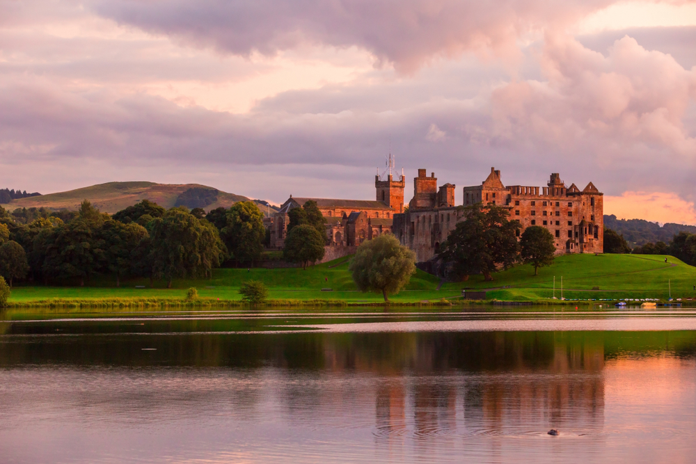 Linlithgow Castle Ruins by the lochside during sunset