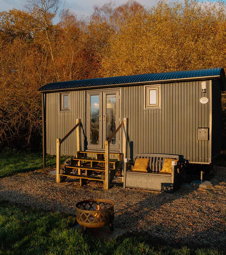The exterior of a Shepherd's Hut at Loch Lomond Waterfront luxury lodges in Balmaha