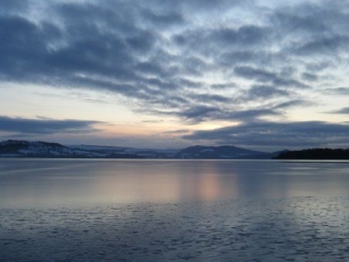 A sunset over Loch Lomond at Loch Lomond Waterfront