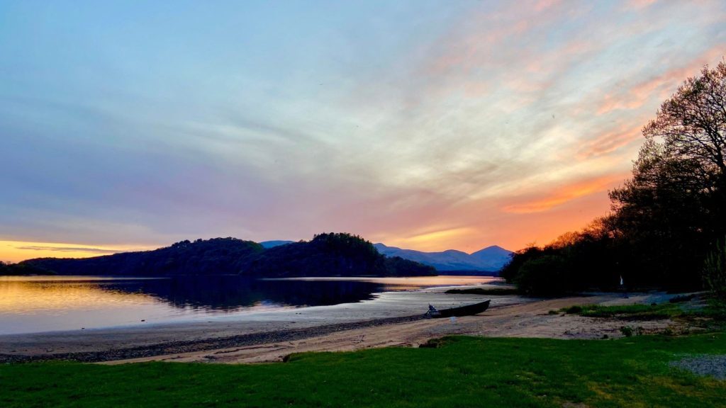 The beach at sunset at Loch Lomond Waterfront