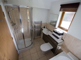 A bathroom  in a chalet at Loch Lomond Waterfront