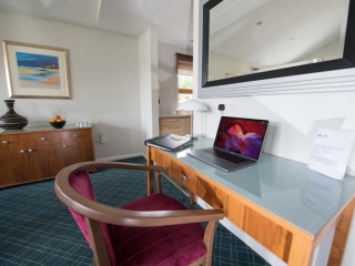 A desk area  in a chalet at Loch Lomond Waterfront