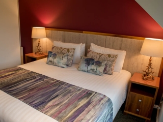 A double bedroom in a lodge at Loch Lomond Waterfront A double bedroom in a lodge at Loch Lomond Waterfront