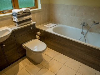 An en-suite bathroom in a lodge at Loch Lomond Waterfront An en-suite bathroom in a lodge at Loch Lomond Waterfront