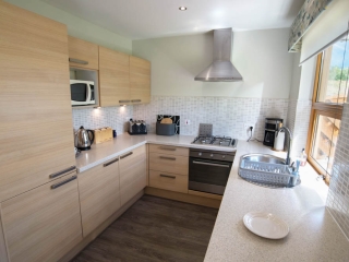 A kitchen in a lodge at Loch Lomond Waterfront A kitchen in a lodge at Loch Lomond Waterfront