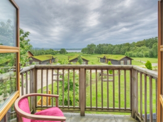 A lodge balcony with view at Loch Lomond Waterfront