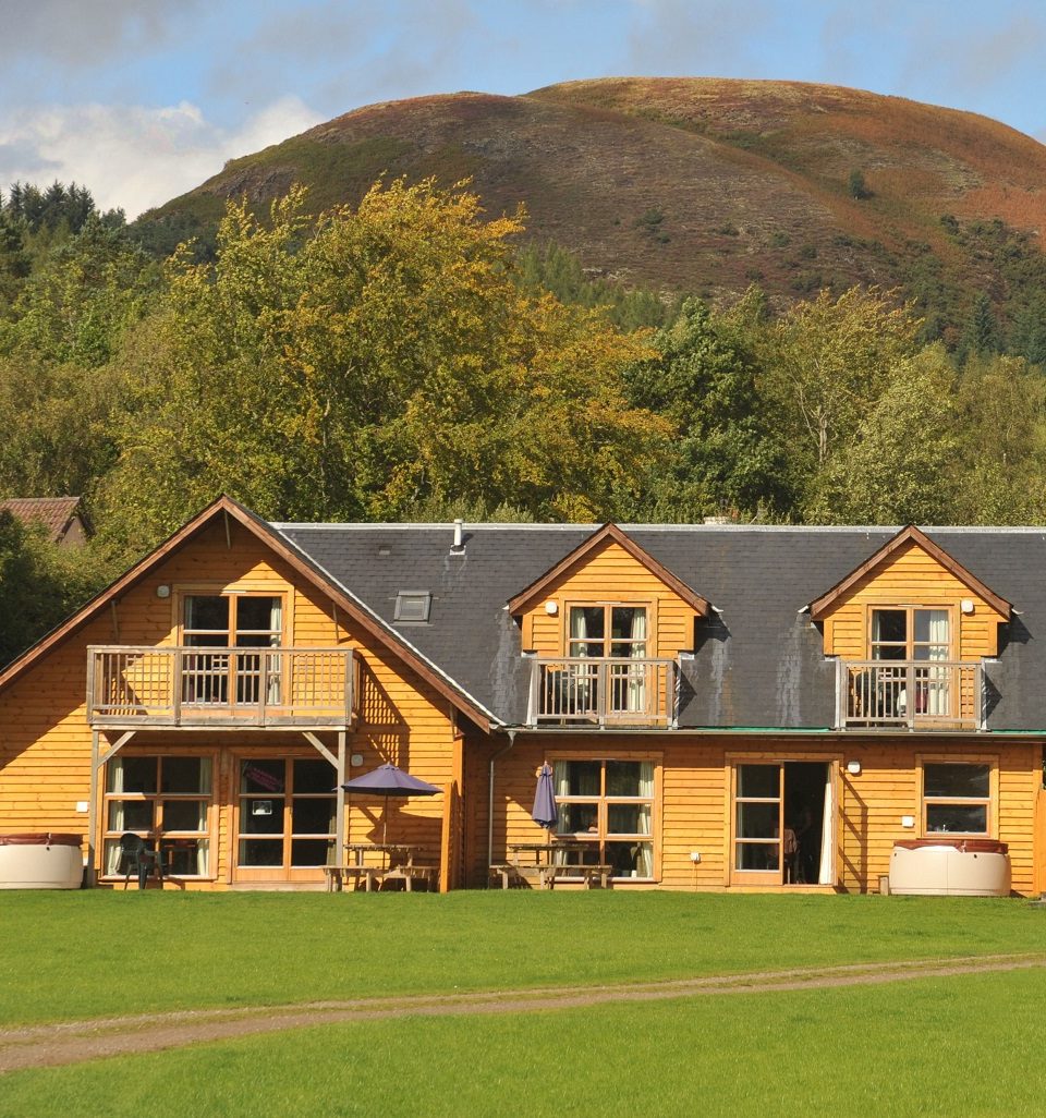 The exterior of a lodge at Loch Lomond Waterfront