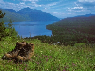 Walking boots with Loch Lomond in the background