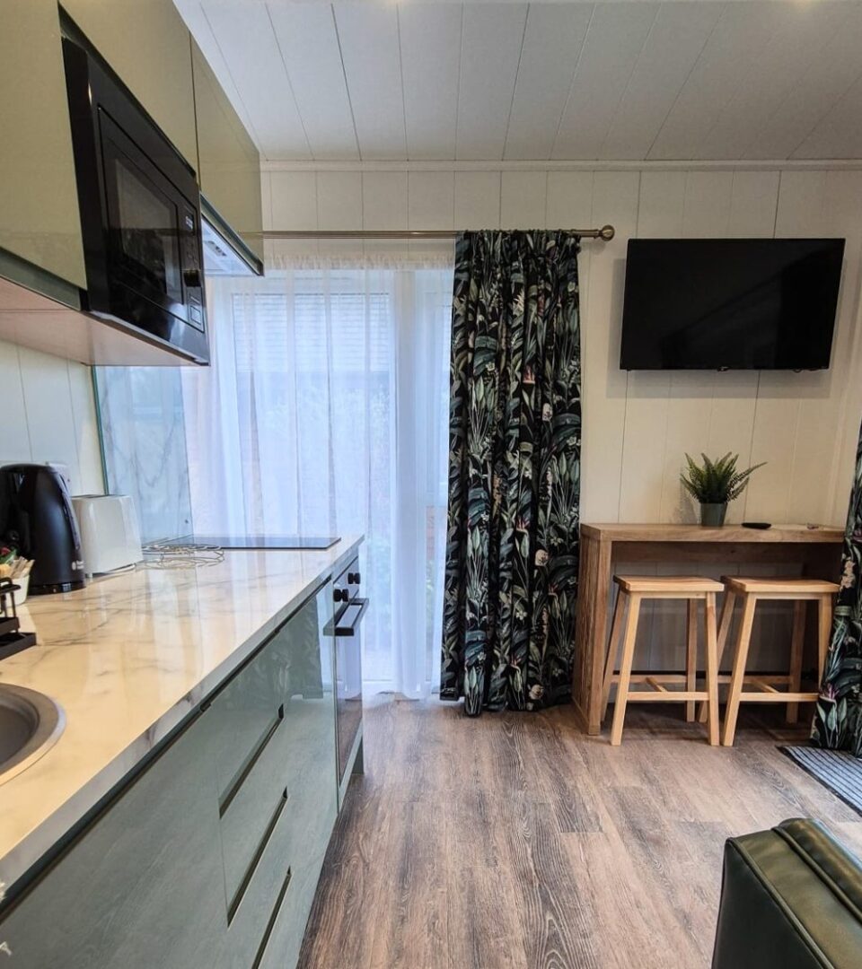 Studio Lodges accommodation kitchen living areas by Loch Lomond.