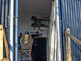 Looking into a Shepherd Hut at Loch Lomond Waterfront