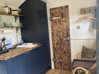 The kitchen in a Shepherd&#039;s Hut at Loch Lomond Waterfront