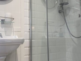 The shower in a Shepherd&#039;s Hut at Loch Lomond