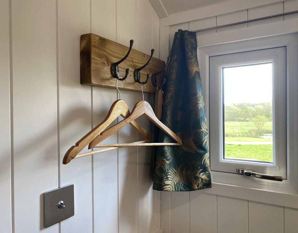 Hooks for hanging clothes in a Shepherd&#039;s Hut at Loch Lomond