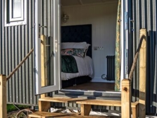 Looking into a Shepherd Hut at Loch Lomond Waterfront