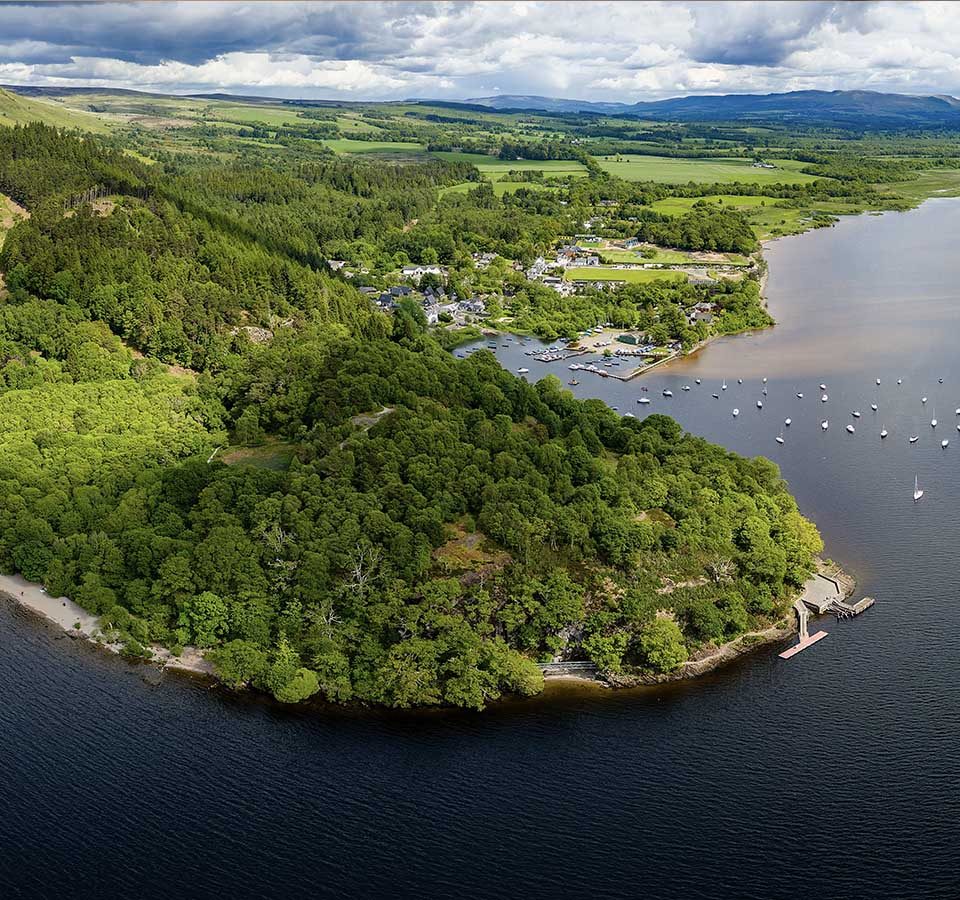 An aerial view of Loch Lomond, Conic HIll and Balmaha where Loch Lomond Waterfront Lodges are.
