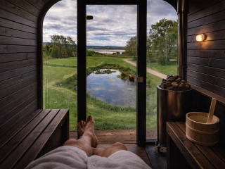 Loch Lomond wilderness wellness sauna view over our pond and the waters shores.